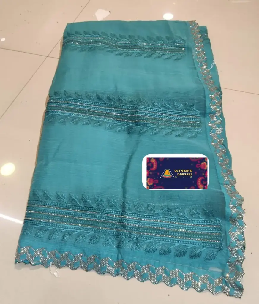Beautiful organza saree with machine embroidery and stone work 